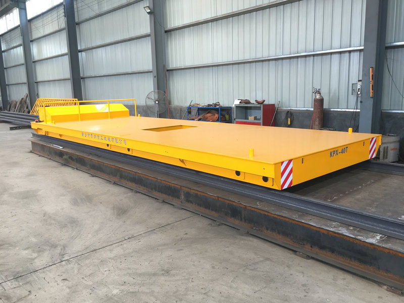 Motorized Battery powered transfer cart on rail.